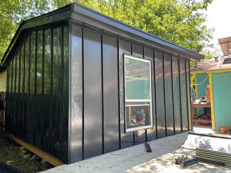 Black standing seam metal wall panels for Roof Inspection in Duarte